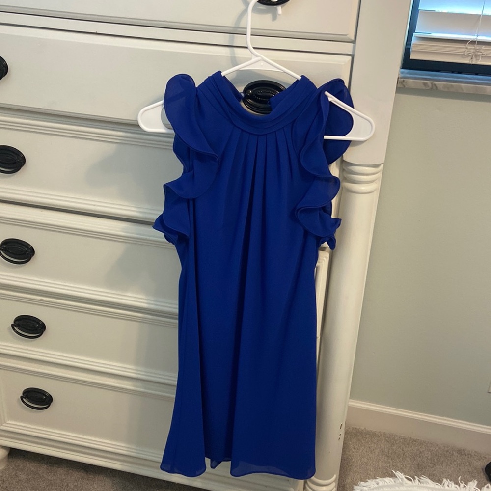 Cute cocktail dress. Color is royal blue, similar to dark purple